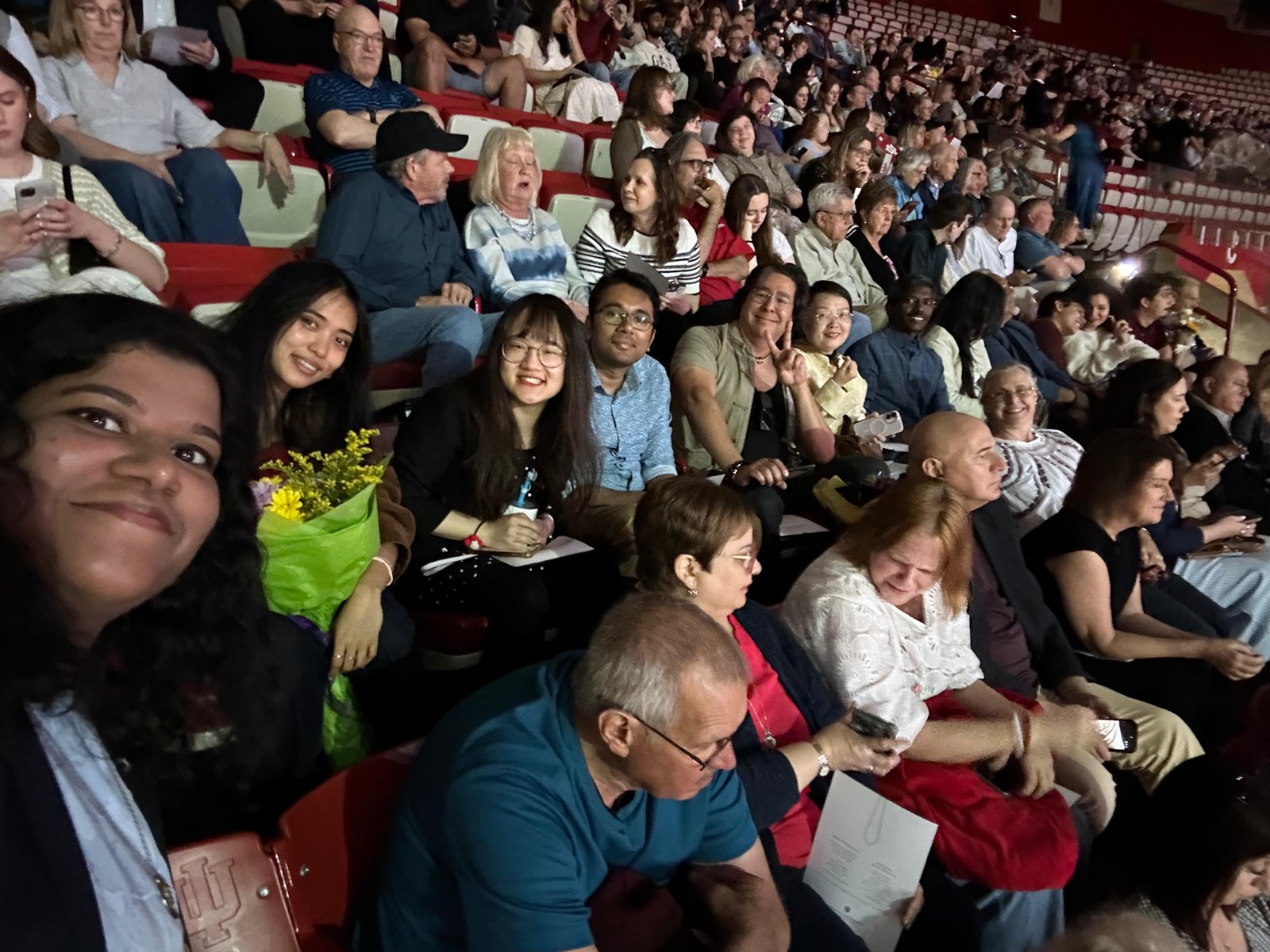 BISM Volunteers cheering on our graduates at the  IU Graduate Ceremony